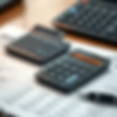 Calculating Financial Data Calculator and notepad representing financial calculations