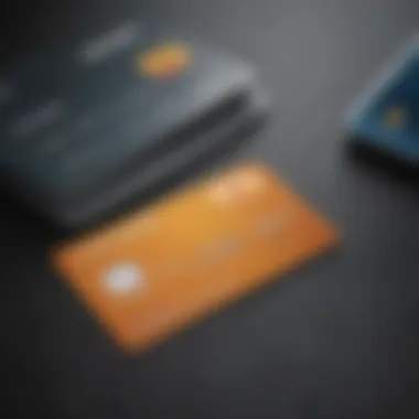 Close-up of a credit card alongside a phone and bill statement