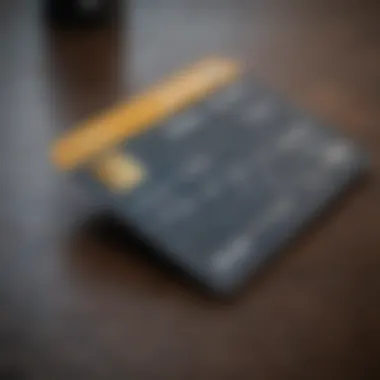 A close-up of a credit card alongside Klarna promotional materials