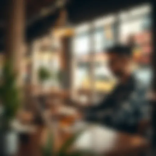 Embracing the Digital Nomad Lifestyle Digital nomad working from a laptop in a café